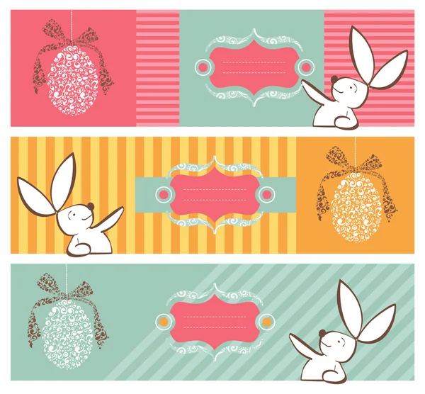 Племенные яйца и баннеры с пасхальными кроликами — стоковый вектор