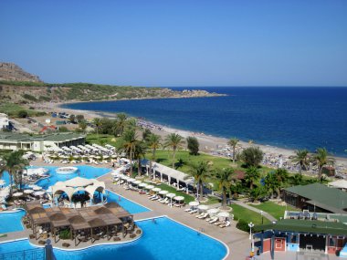 Swimming pool at the modern luxury hotel. clipart