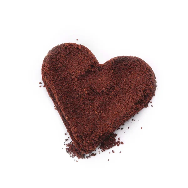 Heart shaped ground coffee isolated on white background — Stock Photo, Image