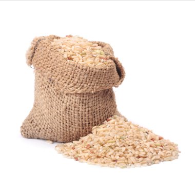 Natural brown rice in small burlap sack clipart