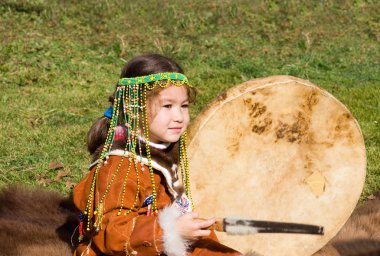 Child with tambourine clipart