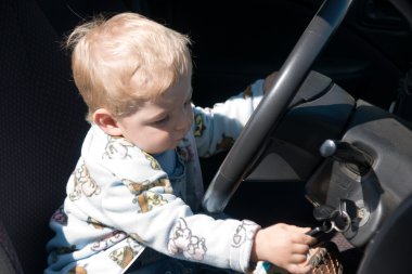 Boy in car