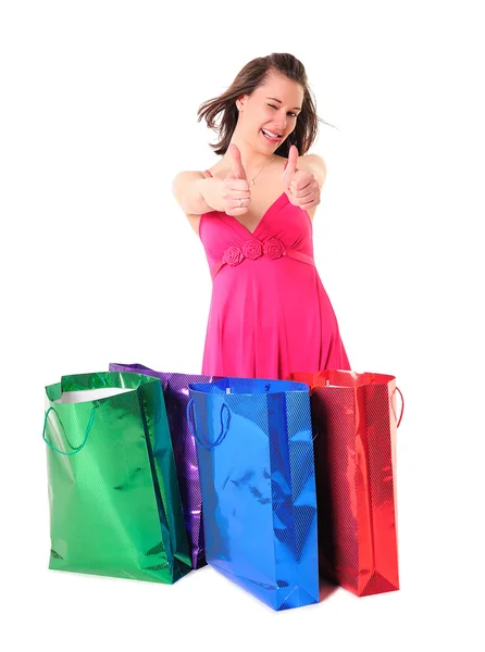Забавная девушка с сумками — стоковое фото