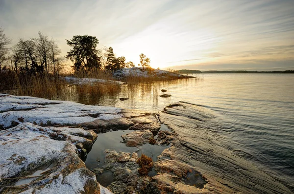 Zachód słońca zimą w Finlandii — Zdjęcie stockowe