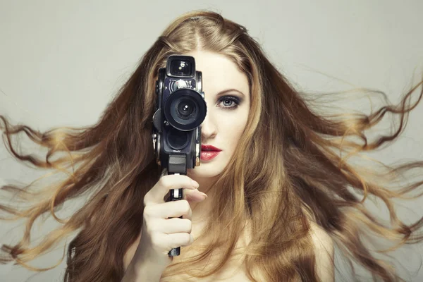 stock image Portrait of a beautiful woman with the camera