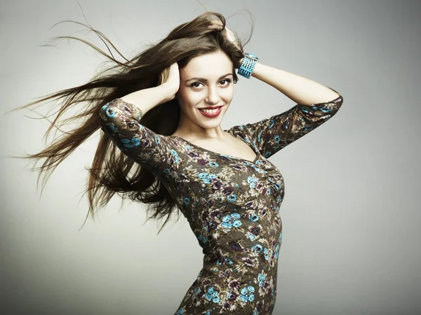 Fashion portrait of a happy young woman smiling — Stock Photo, Image