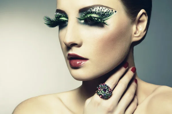 Fashion photo of a young woman with long eyelashes — Stock Photo, Image