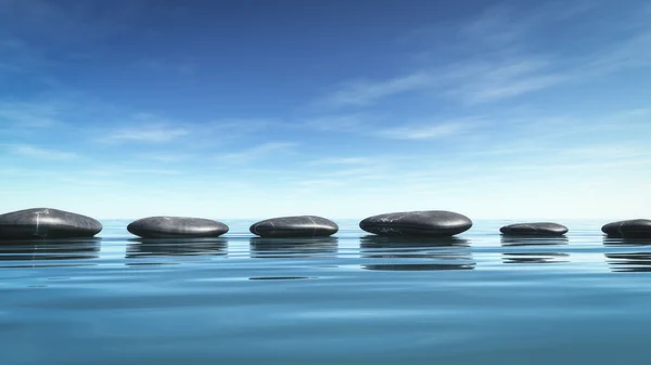 Stap stenen in de blauwe zee — Stockfoto