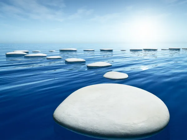 Stap stenen in de blauwe zee — Stockfoto