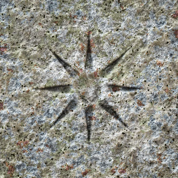 Каменная текстура со звездой — стоковое фото