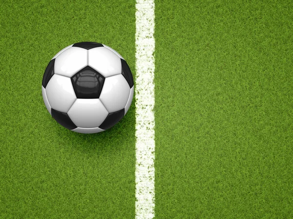 Bola de futebol na grama verde — Fotografia de Stock