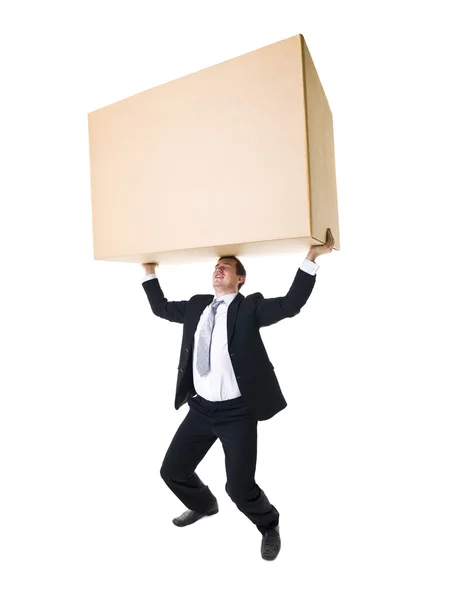 Transportando uma caixa pesada — Fotografia de Stock
