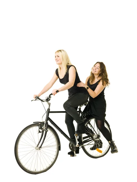 Girls on a bike — Stock Photo, Image