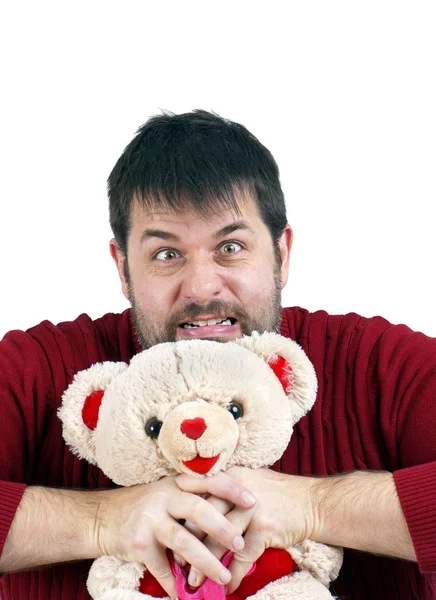 Man strangling teddy bear — Stock Photo, Image