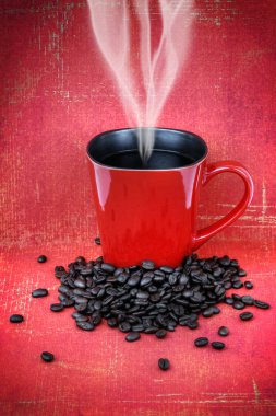 Grungy red cup of coffee clipart
