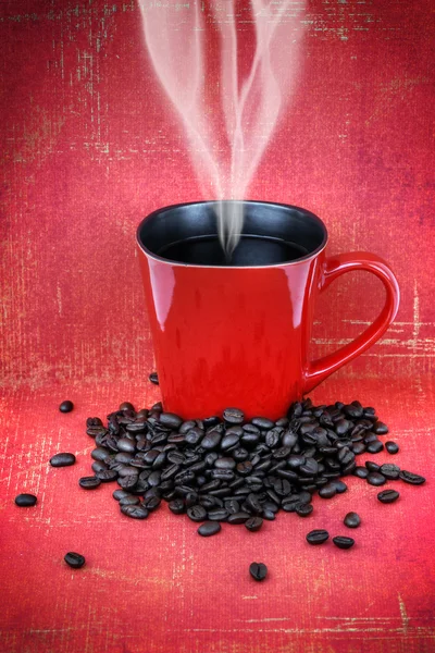 stock image Grungy red cup of coffee