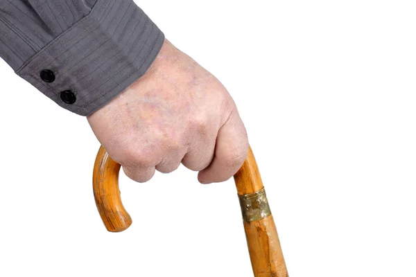 Senior's hand lopen met stok — Stockfoto