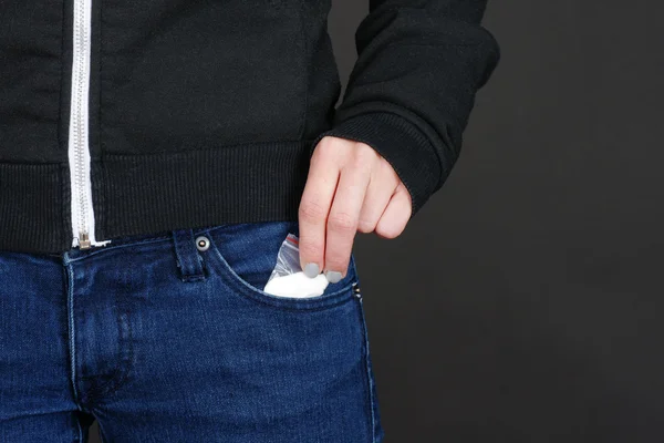 Drugs out of jeans pocket — Stock Photo, Image