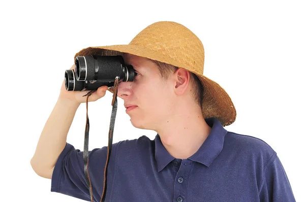 Jonge man met verrekijker en stro hoed — Stockfoto