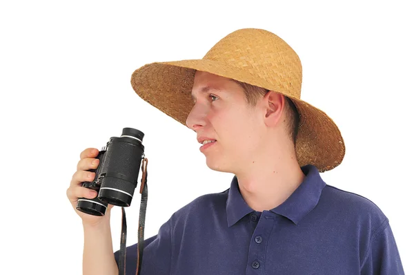 双眼鏡、麦わら帽子を持つ若い男 — ストック写真