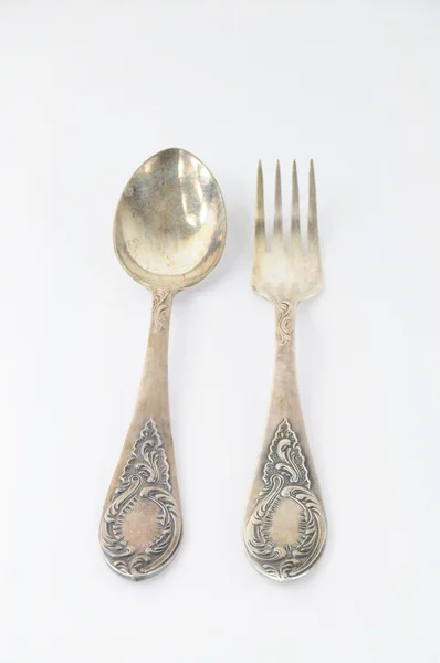 Tenedor de plata vintage y cuchara sobre fondo blanco —  Fotos de Stock