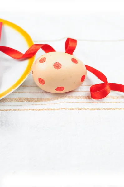 Easter egg with red ribbon — Stock Photo, Image
