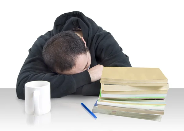 stock image Young man fallen asleep over books