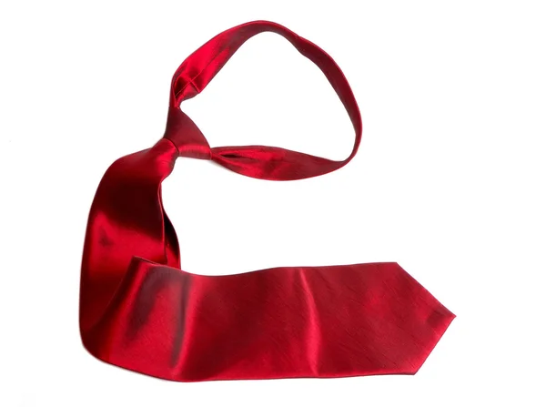 Sağ işaret eden beyaz izole kırmızı saten kravat — Stok fotoğraf