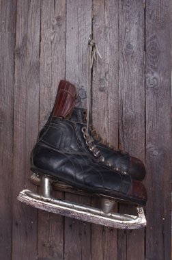 Old hockey skates clipart