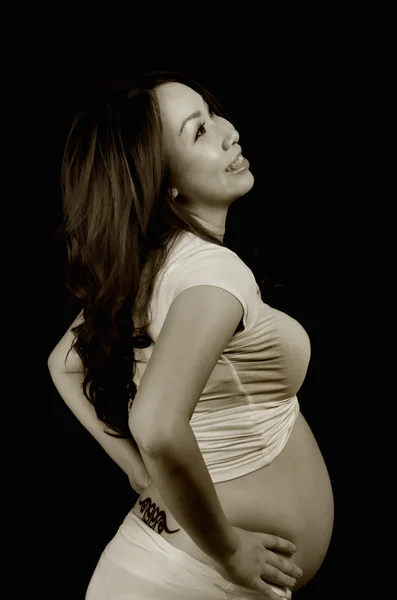 Lykkelig gravid dame - Stock-foto