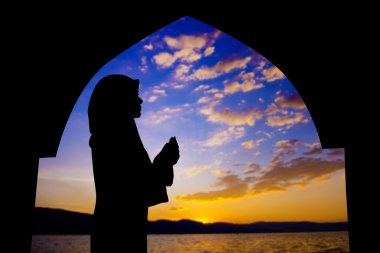 Muslim praying in mosque clipart