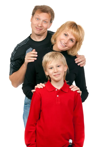 Familia feliz con niño posando —  Fotos de Stock