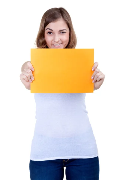 Mooi meisje met een vel geel papier knipoogt — Stockfoto