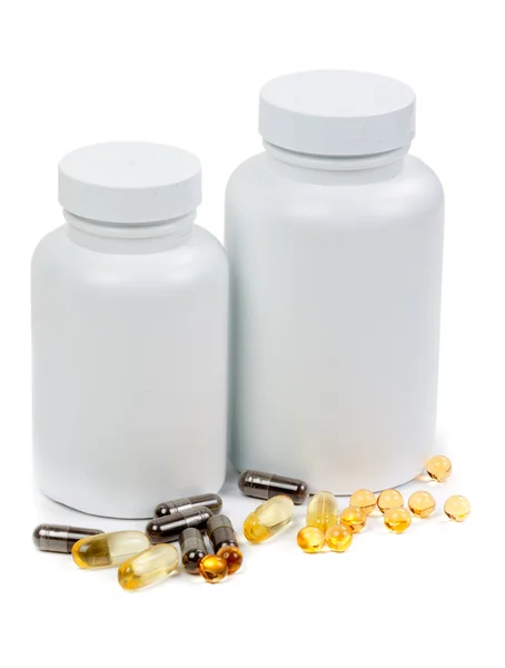 Preparación en píldora y cápsula aisladas sobre fondo blanco —  Fotos de Stock