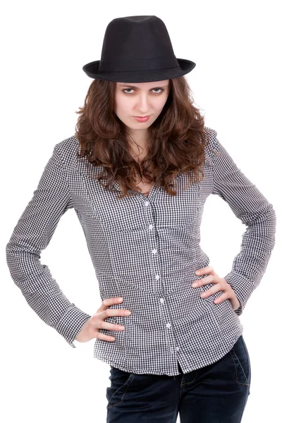 Menina em uma camisa xadrez e chapéu preto — Fotografia de Stock