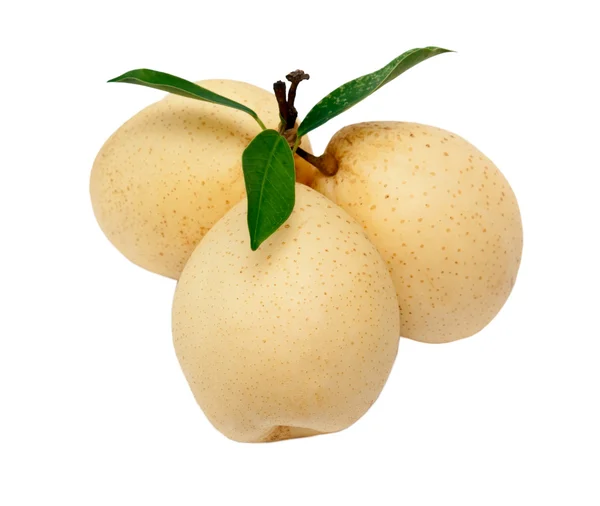Tre mogna gula päron med gröna blad — Stockfoto