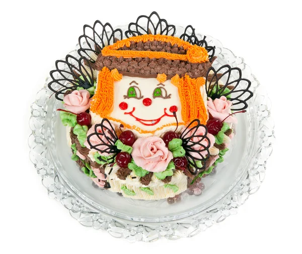 Смачний торт з візерунком у вигляді маленьких облич клоуна — стокове фото