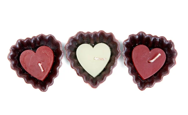 Three candles in the shape of a heart — Stock Photo, Image