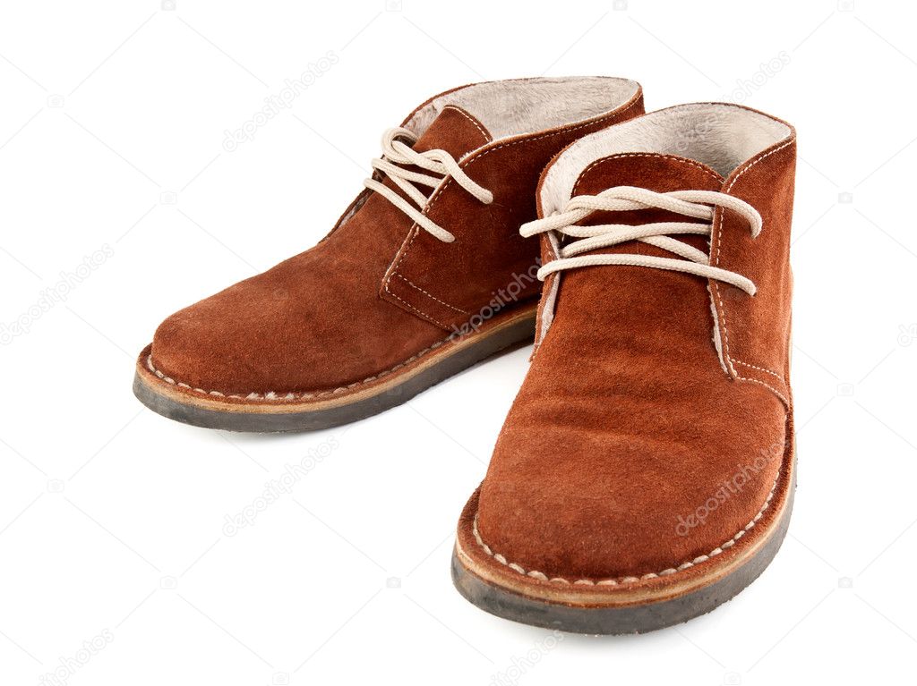 A pair of brown suede shoes