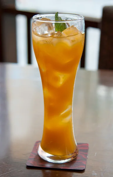 Cocktail, mango juice with ice cubes — Stock Photo, Image