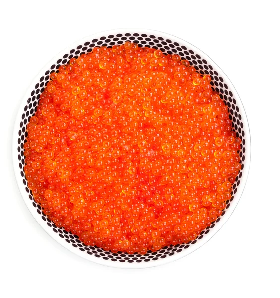 Un plato lleno de caviar rojo fresco — Foto de Stock