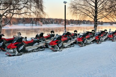 Vehicles are a number of snowmobiles clipart