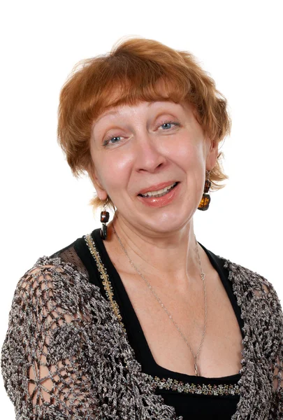 Gülümseyen, orta yaşlı bir kadın portresi — Stok fotoğraf