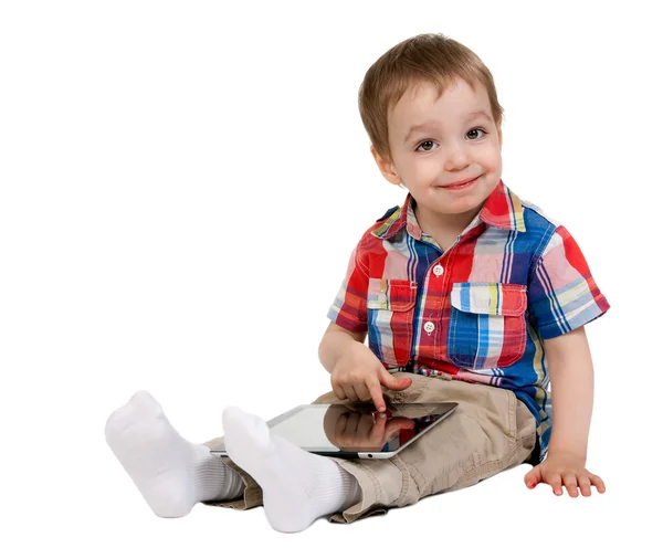 A child with a tablet computer — Stock Photo, Image
