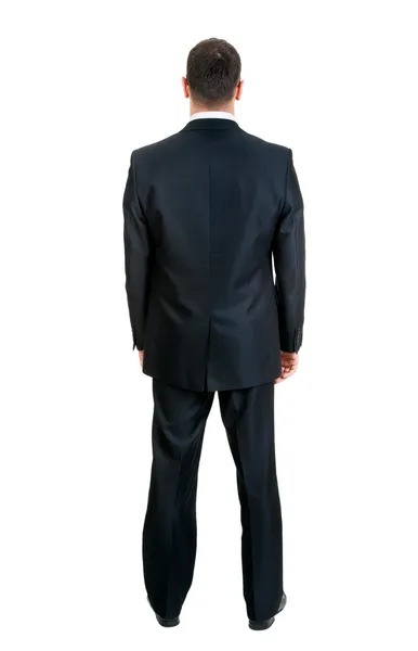 Бизнесмен, стоящий спиной к студии — стоковое фото