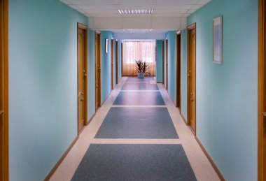 The corridor with blue walls