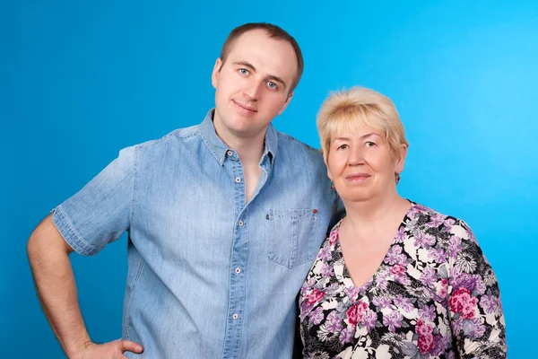 Portrait of mother and son in a studio — Stock Photo, Image