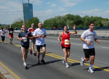 BELGRADE, SERBIA - APRIL 22: A group of marathon competitors during the 25th Belgrade Marathon on April 22, 2012 clipart