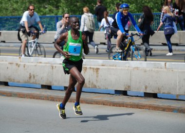 BELGRADE, SERBIA - APRIL 22: James Kiptum Barmasai runs on April 22, 2012 in Belgrade marathon clipart