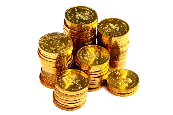 Gouden geld munten geïsoleerd op witte achtergrond — Stockfoto